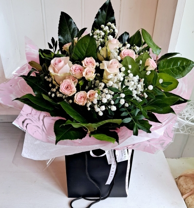 leave it to us  rose bag