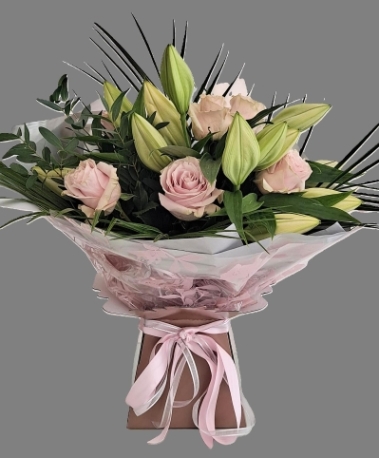 LEAVE IT TO US   LILYS AND ROSES HANDTIED